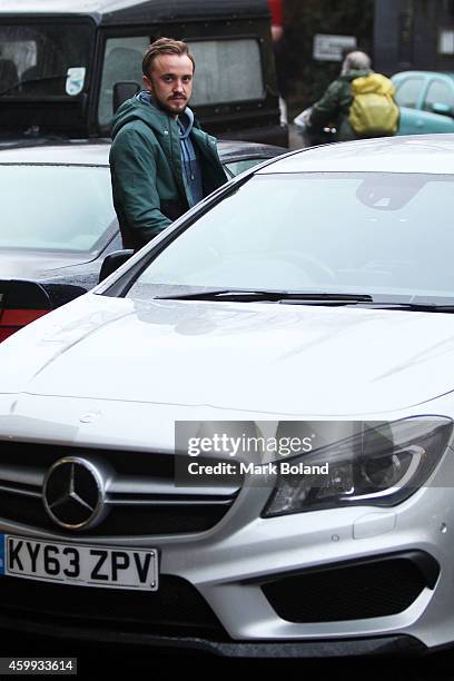 Tom Felton and partner Jade Olivia spotted in Primrose Hill, north London with his Mercedes-Benz CLA 45 AMG on December 4, 2014 in London, England.