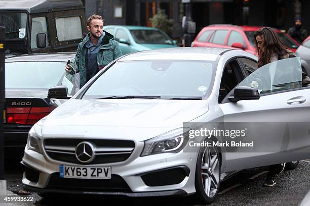 Tom Felton and partner Jade Olivia spotted in Primrose Hill, north London with his Mercedes-Benz CLA 45 AMG on December 4, 2014 in London, England.