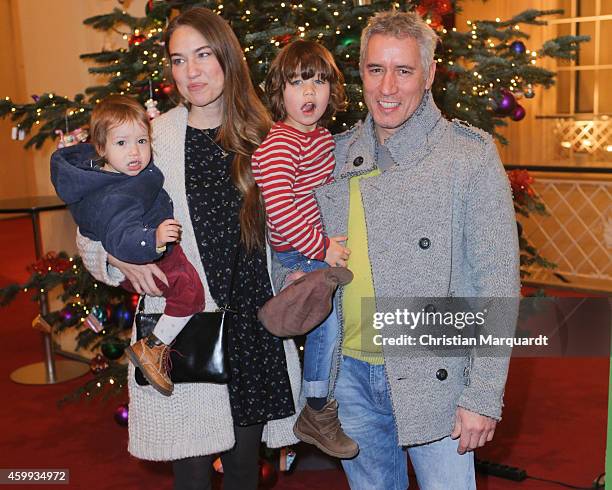 Zora Holt, Ralph Herforth and kids Levin and Marie attend the 'Mein Mali' Book Presentation at Komische Oper on December 4, 2014 in Berlin.