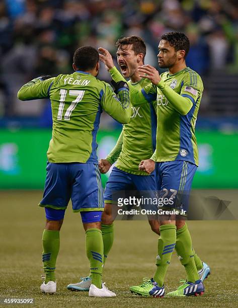Brad Evans of the Seattle Sounders FC celebrates with teammates after scoring a goal against the Los Angeles Galaxy during the Western Conference...