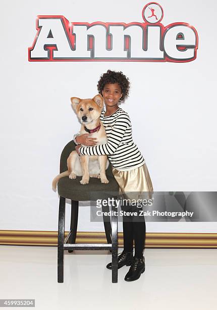Sandy the Dog and Quvenzhane Wallis attend "Annie" Cast Photo Call at Crosby Street Hotel on December 4, 2014 in New York City.