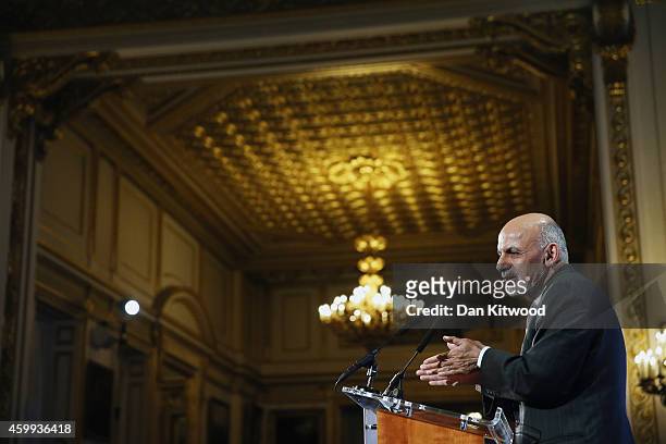 Afghanistan's President Ashraf Ghani speaks to delegates and ministers during the London Conference on Afghanistan in central London on December 4,...
