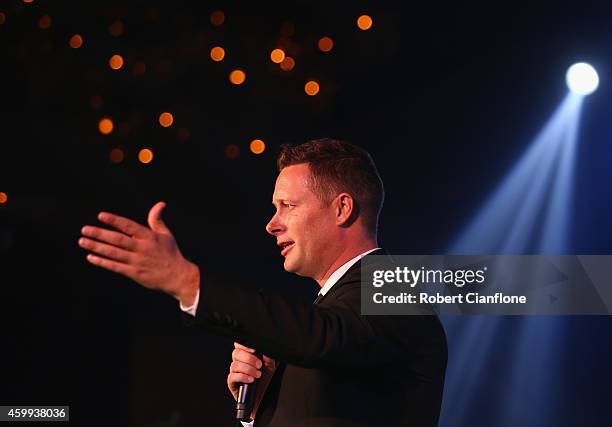 James Davies Yandle, CEO and co-founder of the Global Legends Series, speaks to guests during the Global Legends Series Gala Dinner, at the...