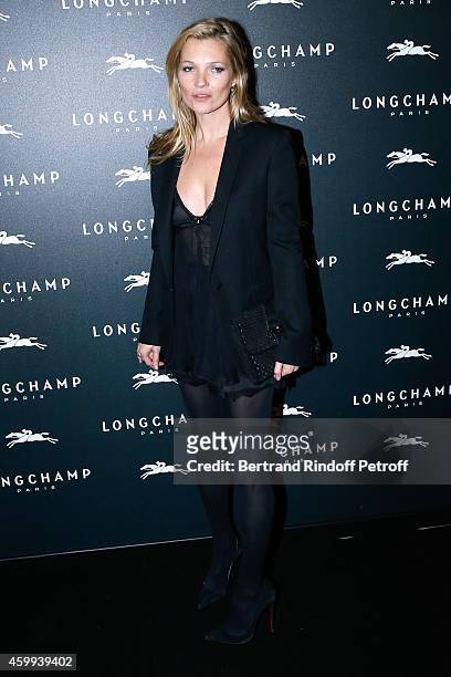 Model Kate Moss attends the Longchamp Elysees "Lights On Party" Boutique Launch on December 4, 2014 in Paris, France.