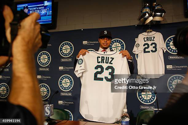Nelson Cruz of the Seattle Mariners poses for a photo following his introductory press conference at Safeco Field on December 4, 2014 in Seattle,...