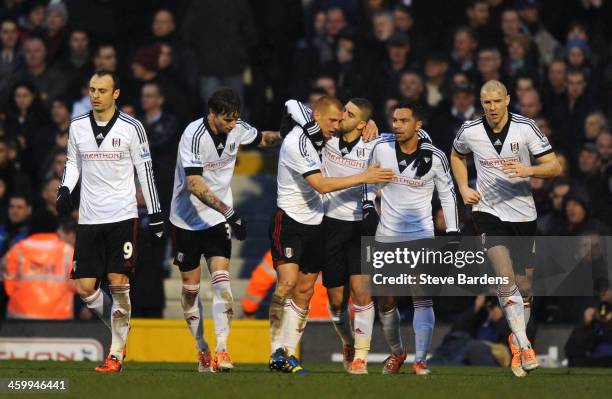 Steve Sidwell of Fulham is kissed by teammate Adel Taarabt after scoring a goal to level the scores at 1-1 during the Barclays Premier League match...