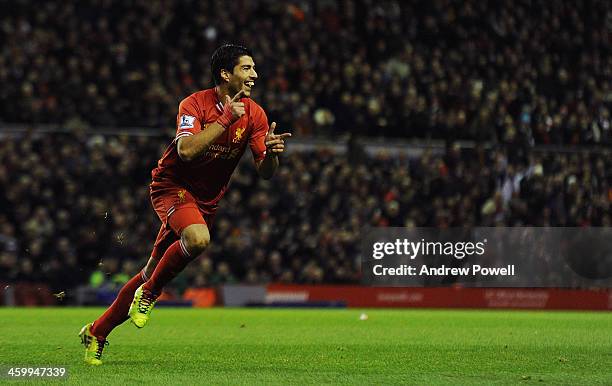 Luis Suarez of Liverpool celebrates his goal during the Barclays Premier League match between Liverpool and Hull City at Anfield on January 1, 2014...