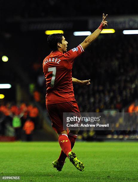Luis Suarez of Liverpool celebrates his goal during the Barclays Premier League match between Liverpool and Hull City at Anfield on January 1, 2014...