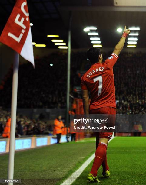 Luis Suarez of Liverpool celebrates his goal during the Barclays Premier League match between Liverpool and Hull City at Anfield on January 1, 2014...