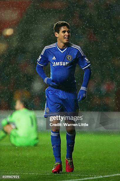 Oscar of Chelsea celebrates after scoring his team's third goal during the Barclays Premier League match between Southampton and Chelsea at St Mary's...