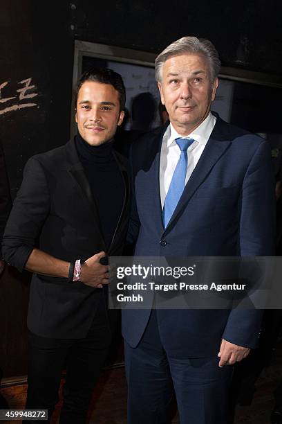 Klaus Wowereit and Kostja Ullmann attend the Medienboard Pre-Christmas Party 2014 at Kraftwerk on December 4, 2014 in Berlin, Germany.