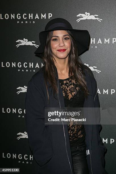 Actress Alice Belaidi attends the 'Longchamp' Elysees lights on Party photocall at Longchamp Boutique Champs-Elysees on December 4, 2014 in Paris,...