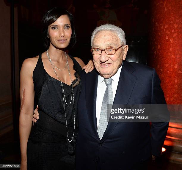 Padma Lakshmi and Henry Kissinger attend Bloomberg Businessweek's 85th Anniversary Celebration at American Museum of Natural History on December 4,...