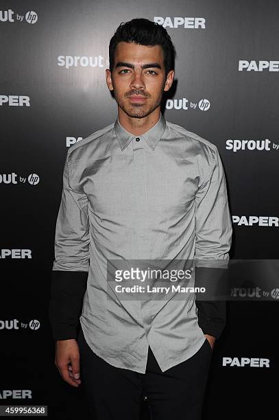 Joe Jonas attends Paper Magazine, Sprout By HP & DKNY Break The Internet Issue Release at 1111 Lincoln Road on December 4, 2014 in Miami, Florida.