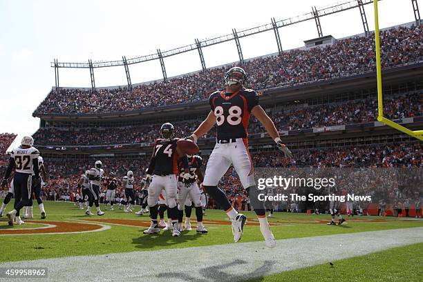 Tony Scheffler and Ryan Harris of the Denver Broncos celebrate during a game against the San Diego Chargers on September 14, 2008 at Invesco Field at...