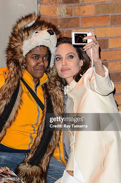 Actress Angelina Jolie leaves the "Daily Show With Jon Stewart" taping at NEP Studio 52 on December 4, 2014 in New York City.