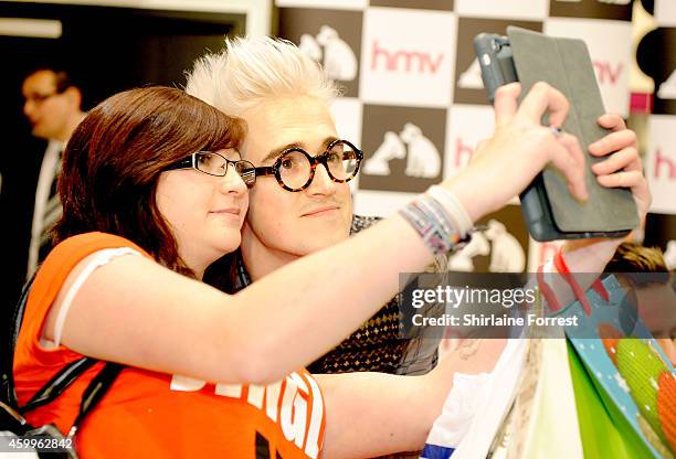 Tom Fletcher of McBusted meets fans and signs copies of their new self titled album at HMV Manchester on December 4, 2014 in Manchester, England.