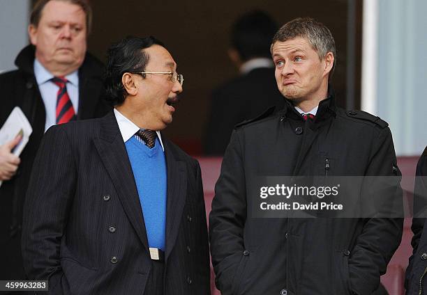 Cardiff City Owner Vincent Tan chats to Ole Gunnar Solskjaer before the match Arsenal against Cardiff City in the Barclays Premier League at Emirates...