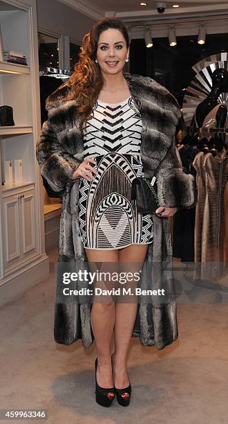 Nina Naustdal attends the Herve Leger Christmas Party on December 4, 2014 in London, England.