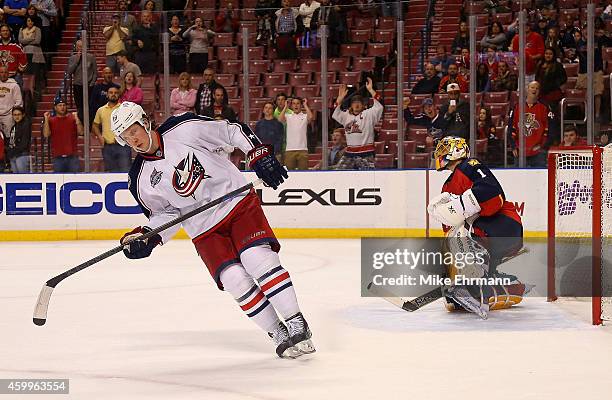 Ryan Johansen of the Columbus Blue Jackets scores the game winning goal against Roberto Luongo of the Florida Panthers during a game at BB&T Center...