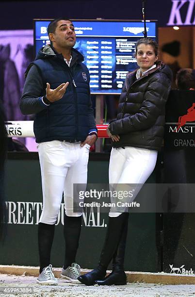 Alvaro de Miranda Neto of Brazil, better known as Doda and his wife Athina Onassis of Greece compete during day 1 of the Gucci Paris Masters 2014 at...