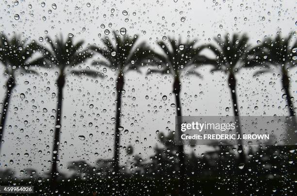 Raindrops are seen on a vehicle's window in Arcadia, California, on December 2 amid a steady and sometimes heavy rainfall soaking southern California...