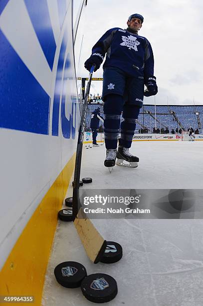 Frazer McLaren of the Toronto Maple Leafs moves a puck during the 2014 Bridgestone NHL Winter Classic team practice session on December 31, 2013 at...