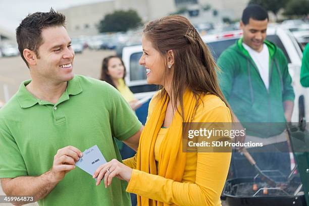 Taking Tickets Handing Out Tickets Photos and Premium High Res Pictures - Getty Images