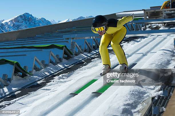 portrait of young ski jumper at inrun - ski jumping stock pictures, royalty-free photos & images