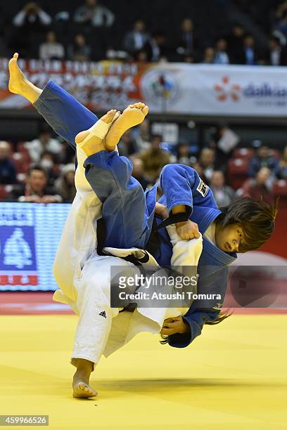 Laetitia Blot of France and Tsukasa Yoshida of Japan compete in Women's -57kg during Judo Grand Slam Tokyo 2014 at Tokyo Metropolitan Gymnasium on...