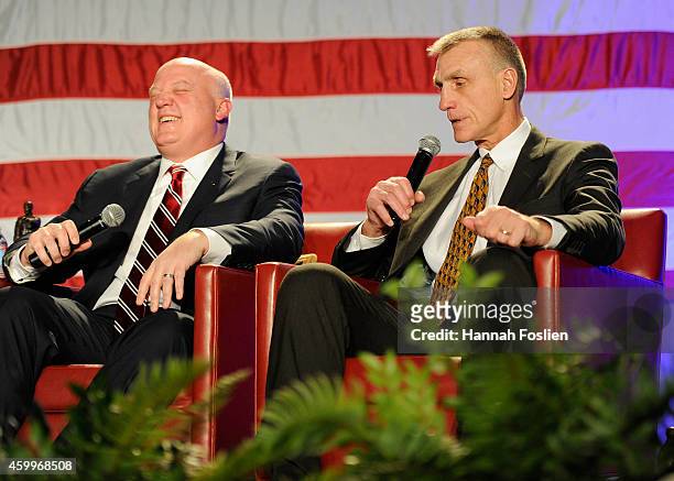 Bill Daly and Pul Holmgren speak after each received the Lester Patrick Trophy during the U.S. Hockey Hall of Fame Induction Ceremony at Minneapolis...