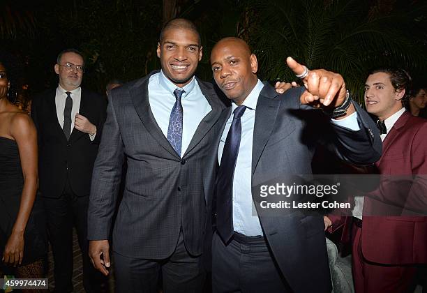 Football player Michael Sam and comedian Dave Chappelle attend the 2014 GQ Men Of The Year party at Chateau Marmont on December 4, 2014 in Los...
