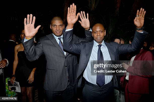 Football player Michael Sam and comedian Dave Chappelle attend the 2014 GQ Men Of The Year party at Chateau Marmont on December 4, 2014 in Los...