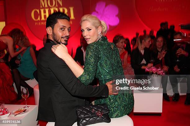 Sarah Kern and her fiance Alieu during the Mon Cheri Barbara Tag 2014 at Haus der Kunst on December 4, 2014 in Munich, Germany.