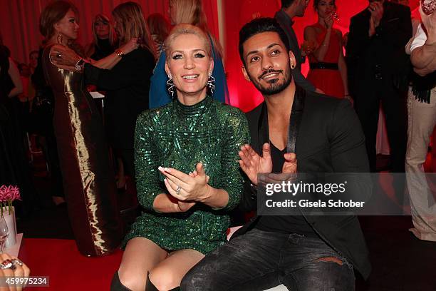 Sarah Kern and her fiance Alieu during the Mon Cheri Barbara Tag 2014 at Haus der Kunst on December 4, 2014 in Munich, Germany.