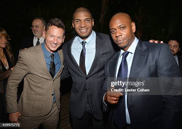 Editor-in-Chief Jim Nelson, football player Michael Sam, and comedian Dave Chappelle attend the 2014 GQ Men Of The Year party at Chateau Marmont on...