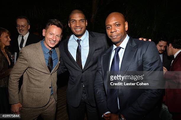 Editor-in-Chief Jim Nelson, football player Michael Sam, and comedian Dave Chappelle attend the 2014 GQ Men Of The Year party at Chateau Marmont on...