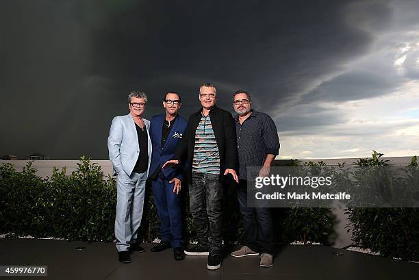 Tim Farriss, Kirk Pengilly, Jon Farriss and Andrew Farriss of INXS pose at the special Quadruple Platinum plaque presentation at Universal Music on...