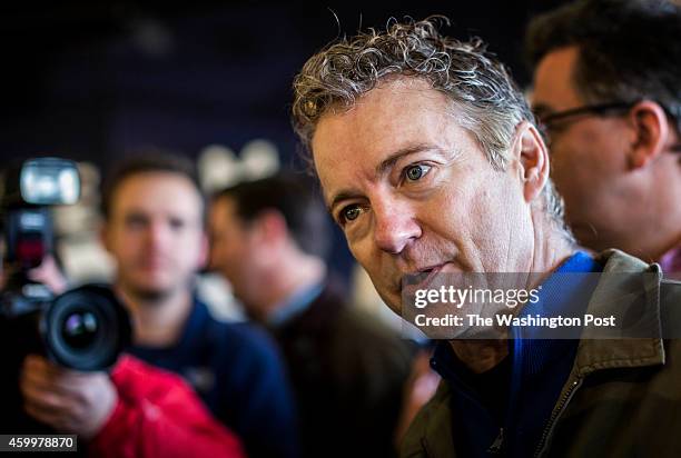 Senator Rand Paul talks to voters during a Senate Minority Leader Mitch McConnell rally inside an airport hanger in Louisville, Kentucky, Monday...