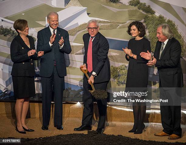 David M. Rubenstein hoists the first shovel of dirt during the Kennedy Center's ceremonial groundbreaking for its new expansion project , on December...