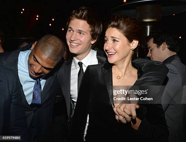 Football player Michael Sam, actor Ansel Elgort and actress Shailene Woodley attend the 2014 GQ Men Of The Year party at Chateau Marmont on December...