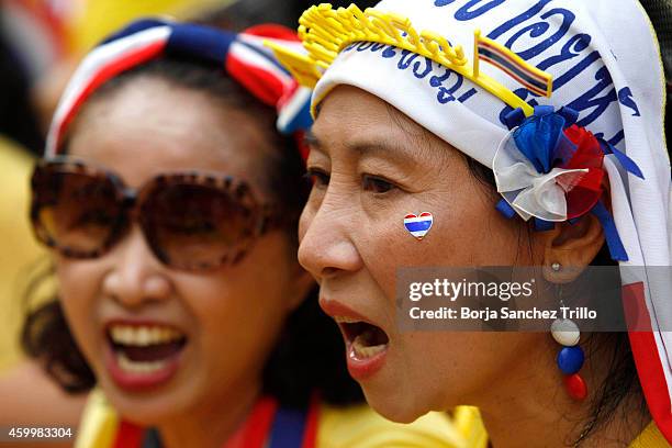 Thai well-wishers sing as they gather at Siriraj Hospital on December 5, 2014 in Bangkok, Thailand. Thailand celebrates their King's 87th Birthday as...