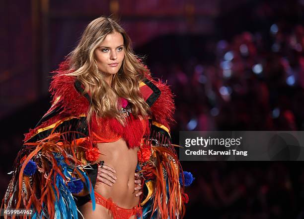 Kate Grigorieva walks the runway at the annual Victoria's Secret fashion show at Earls Court on December 2, 2014 in London, England.
