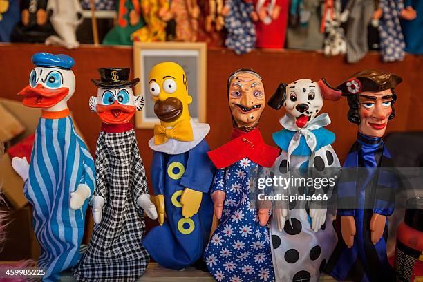 puppet figurine collection in rome - donald duck stock pictures, royalty-free photos & images