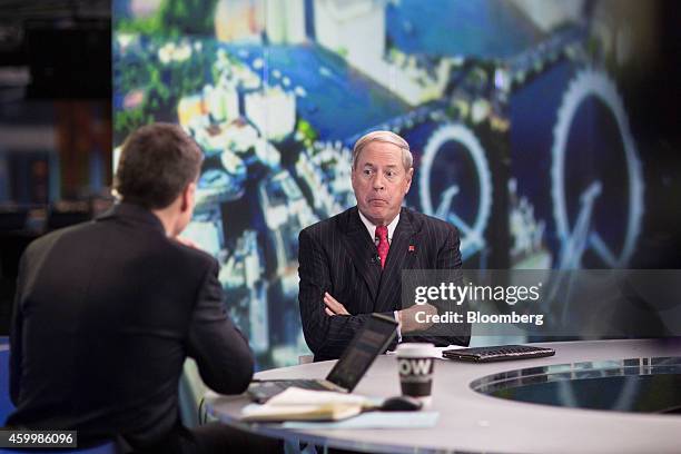 Vernon Hill, chairman of Metro Bank Plc, right, reacts during a Bloomberg Television interview in London, U.K., on Friday, Dec. 5, 2014. As the...