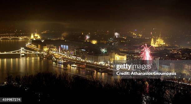 Panoramic view of Budapest with fireworks at New Years Day from the Gellert Hill on Decemper 31, 2011 in Budapest, Hungary.