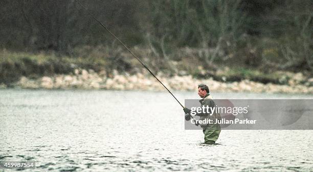 Prince Charles fishing on The River Dee, in Ballater, near Balmoral Estate, on April 29, 1995 in Ballater, Scotland.