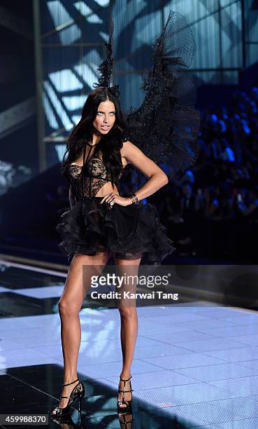 Adriana Lima walks the runway at the annual Victoria's Secret fashion show at Earls Court on December 2, 2014 in London, England.