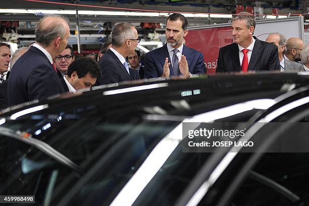 Spain's King Felipe VI visits the Seat factory in Martorell, near Barcelona, on December 5 on the occasion of the 30th anniversary of the Ibiza...