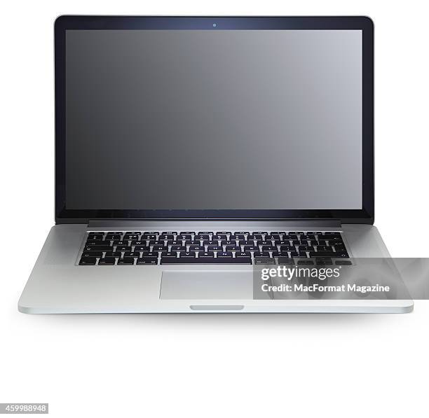 An Apple MacBook laptop computer photographed on a white background, taken on October 31, 2013.